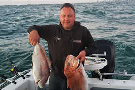 Leigh of Evolution Marine, on boat, with fish