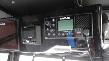 EMC-630CC, T-Top, Simrad MFD and VHF Radio, JL Audio controller