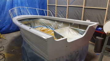 Hull in primer, ready for topcoats